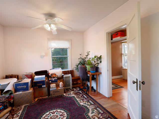 155 West Center Street Fillmore, UT 84631 - Photo 36 of 86 Room featuring a single window, a ceiling fan with integrated lighting, and a doorway opening to an additional space