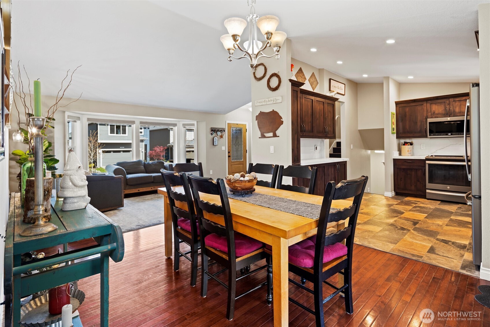 3804 199th Street Southeast Bothell, WA 98012 - Photo 13 of 33 a view of a dining room with furniture and wooden floor