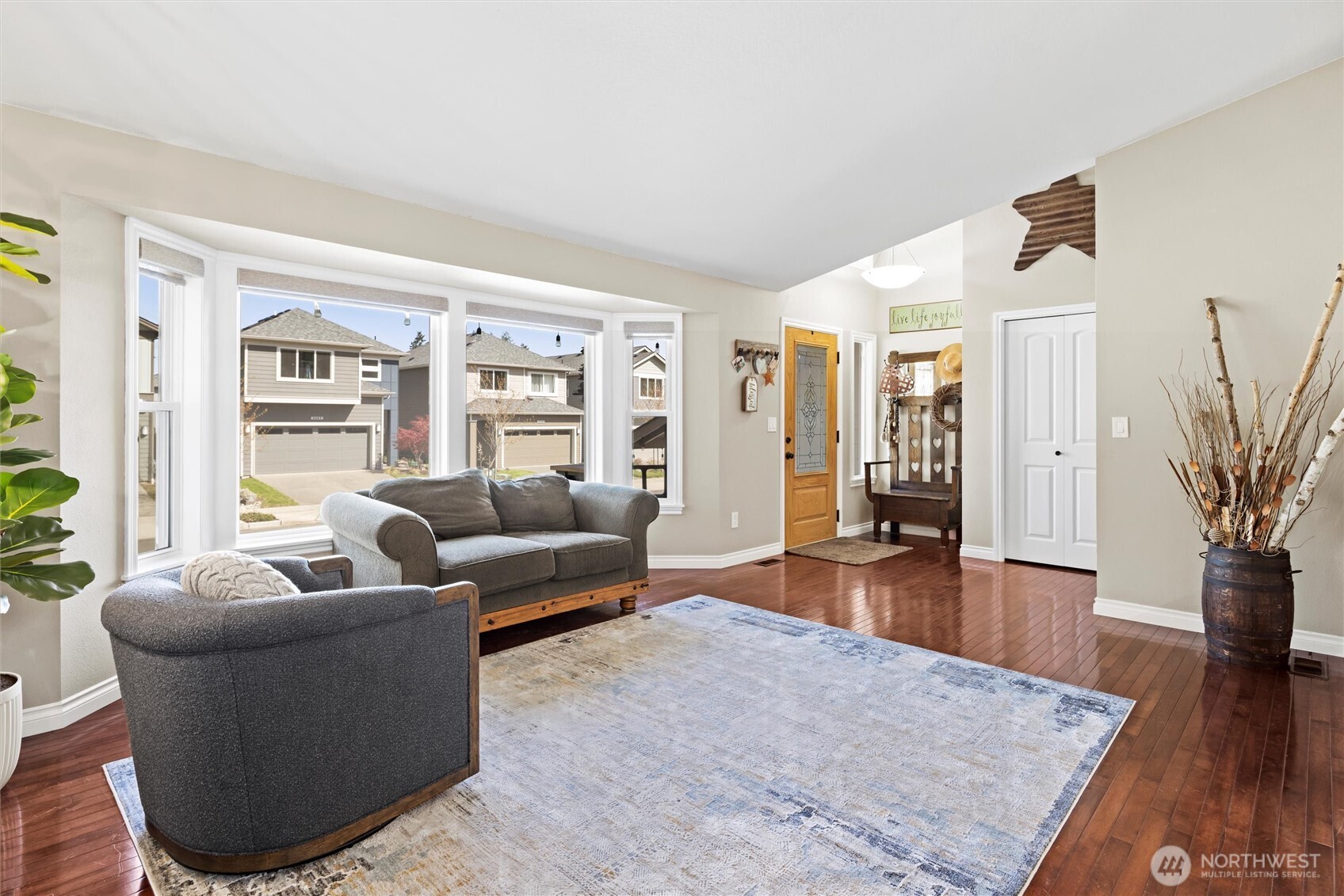 3804 199th Street Southeast Bothell, WA 98012 - Photo 10 of 33 a living room with furniture and a large window