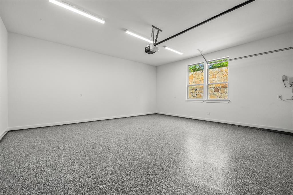 9008 Crosswind Drive Fort Worth, TX 76179 - Photo 38 of 40 Epoxy garage floor!