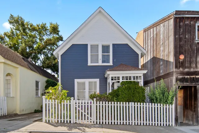 a front view of a house with a porch