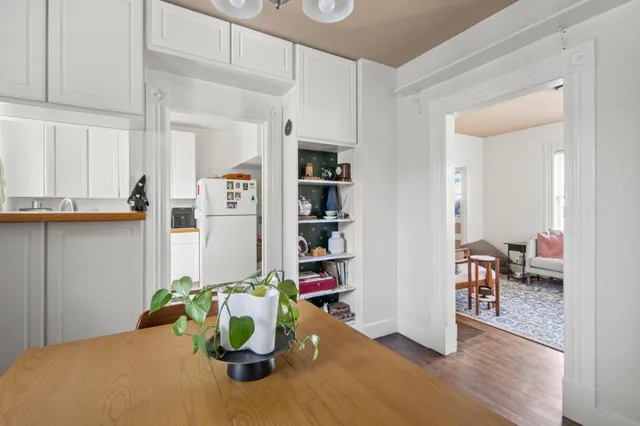 a view of entryway with wooden floor