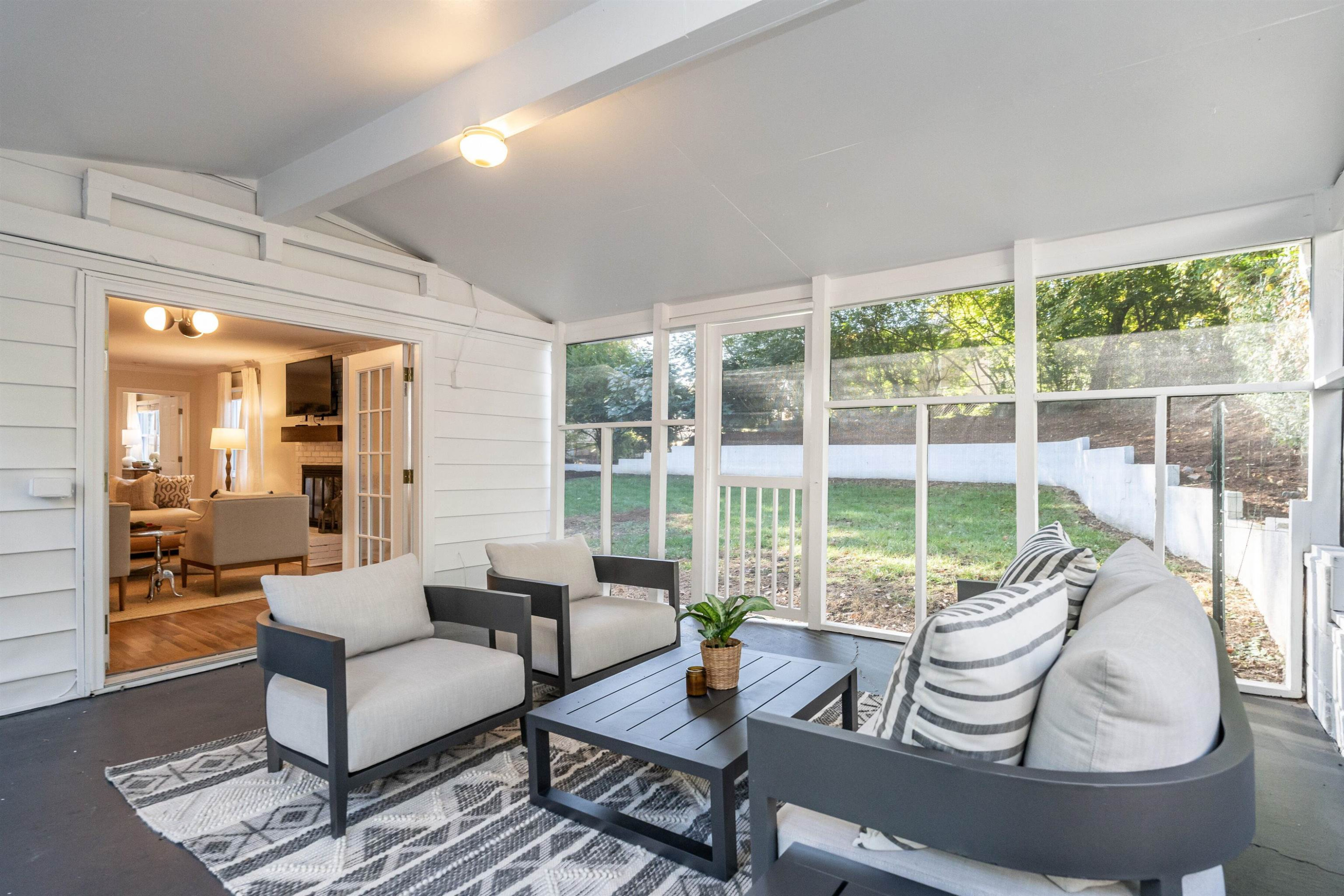 2408 Remington Road Raleigh, NC 27610 - Photo 27 of 31 a living room with furniture and a large window