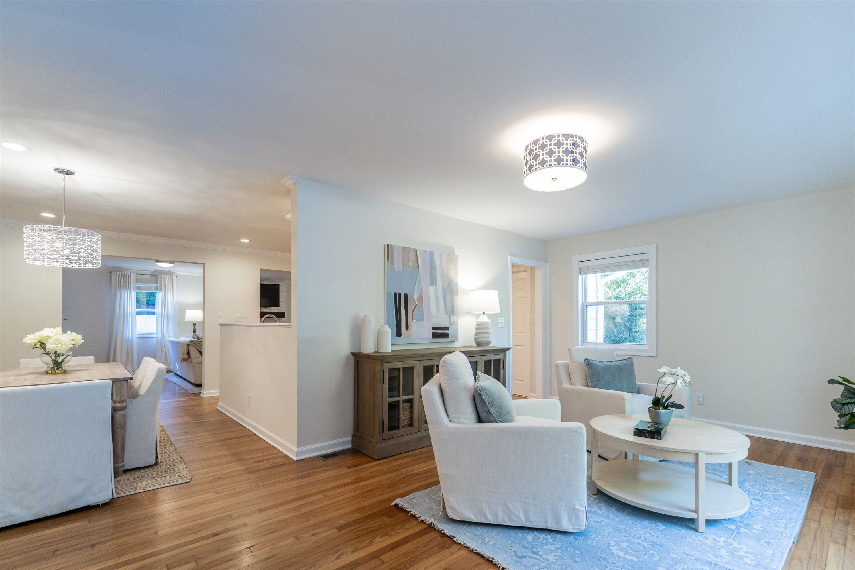 2408 Remington Road Raleigh, NC 27610 - Photo 4 of 31 a living room with furniture and wooden floor