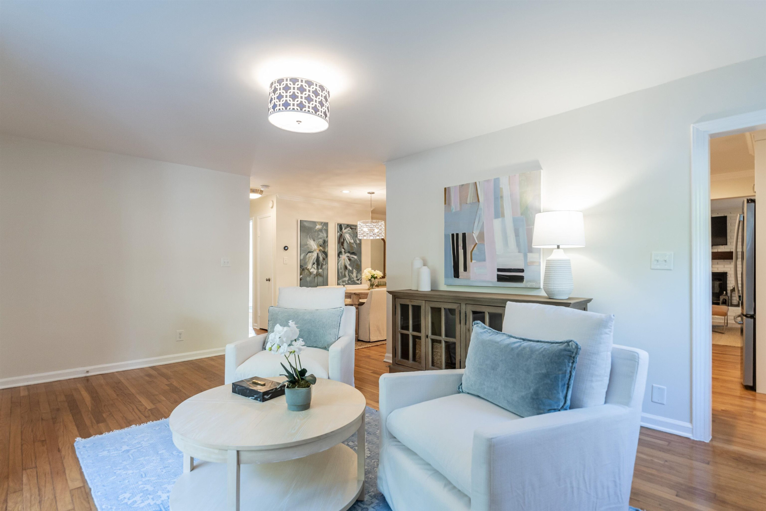 2408 Remington Road Raleigh, NC 27610 - Photo 6 of 31 a living room with furniture and a table