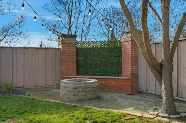 a view of a backyard of the house
