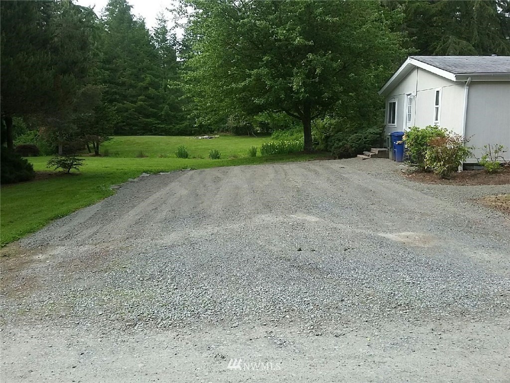 11510 Bollenbaugh Hill Road Monroe, WA 98272 - Photo 3 of 15 a view of a house with backyard and trees