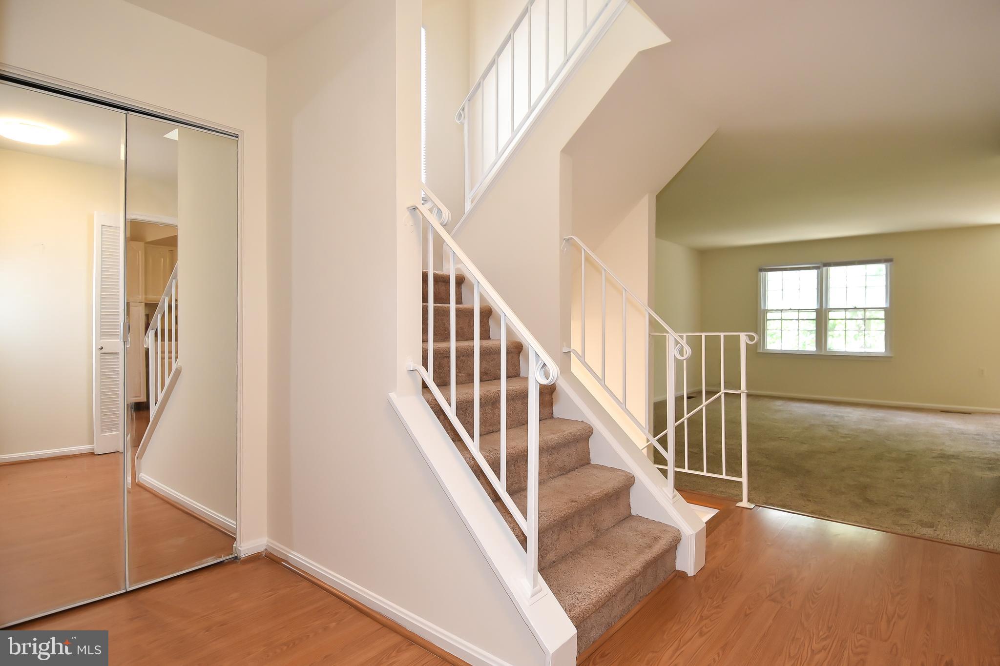 3011 Seminole Road Woodbridge, VA 22192 - Photo 6 of 55 Coat Closet & Stairs to upper level