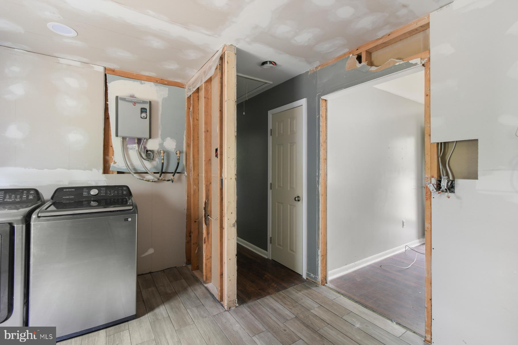 32548 Mt Olive Road Salisbury, MD 21804 - Photo 14 of 16 a view of a livingroom with wooden floor and furniture
