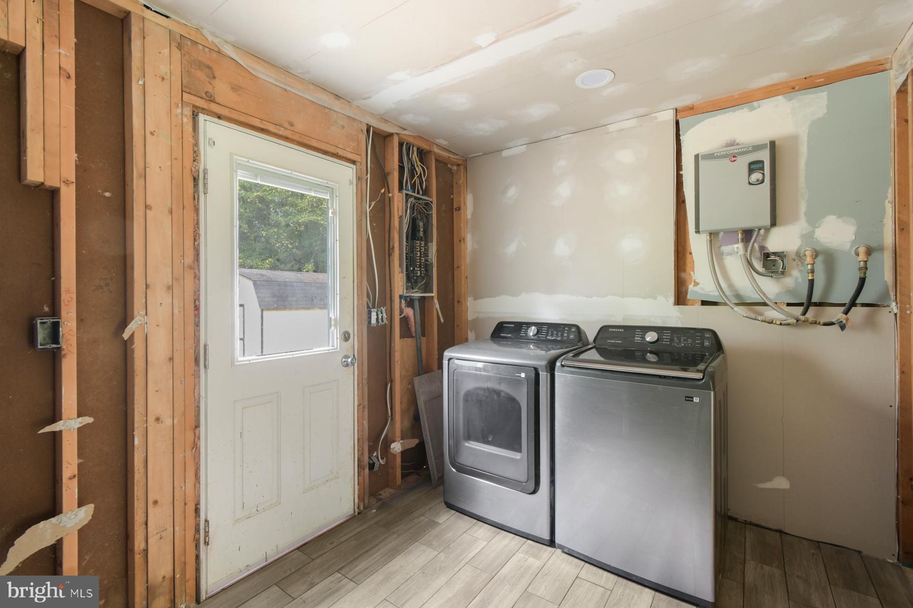 32548 Mt Olive Road Salisbury, MD 21804 - Photo 3 of 16 a room with storage and utility