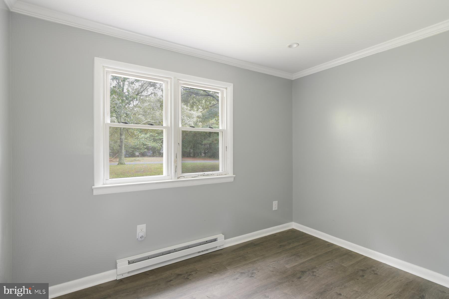 32548 Mt Olive Road Salisbury, MD 21804 - Photo 9 of 16 an empty room with a window