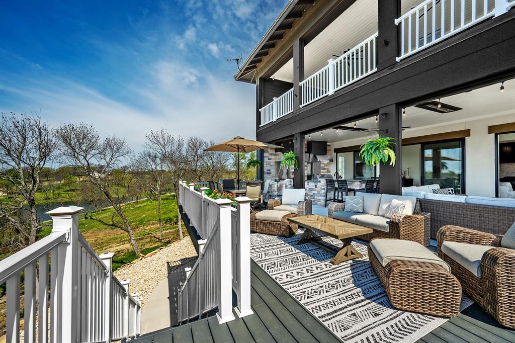 4509 Peach Tree Lane Kingston, OK 73439 - Photo 6 of 39 a view of a patio with couches table and chairs