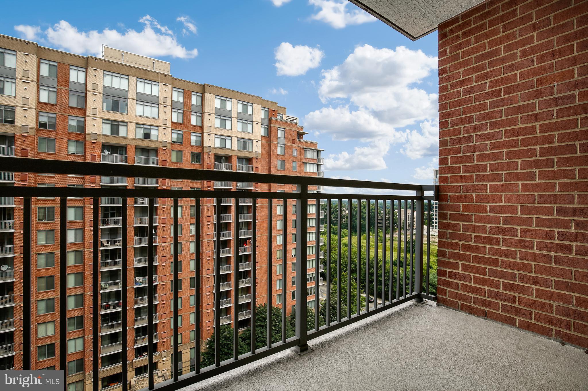 11710 Old Georgetown Road, Unit 1124 North Bethesda, MD 20852 - Photo 18 of 30 a view of a large building from a balcony