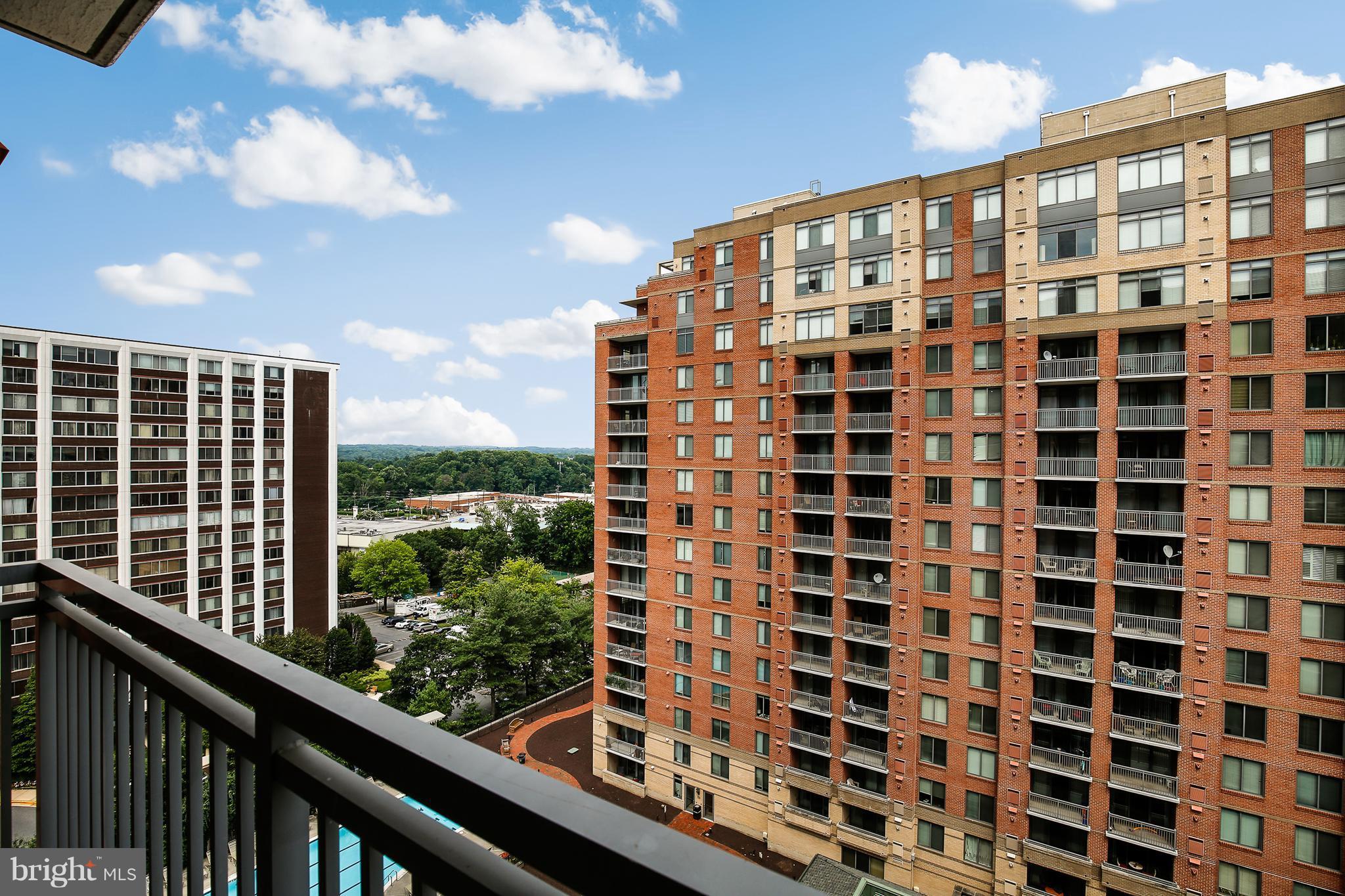 11710 Old Georgetown Road, Unit 1124 North Bethesda, MD 20852 - Photo 19 of 30 a view of a building from a balcony