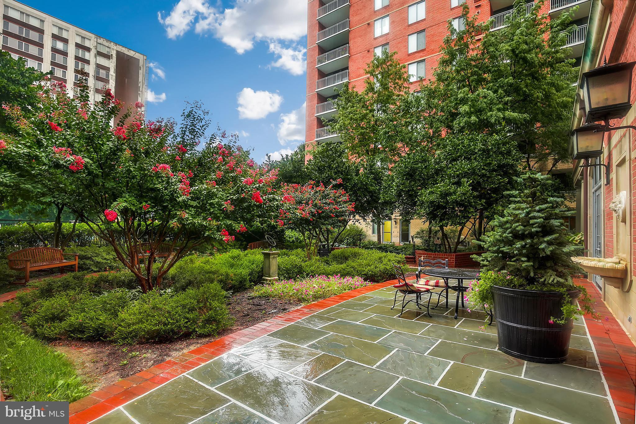 11710 Old Georgetown Road, Unit 1124 North Bethesda, MD 20852 - Photo 22 of 30 a view of a chairs and tables in the patio