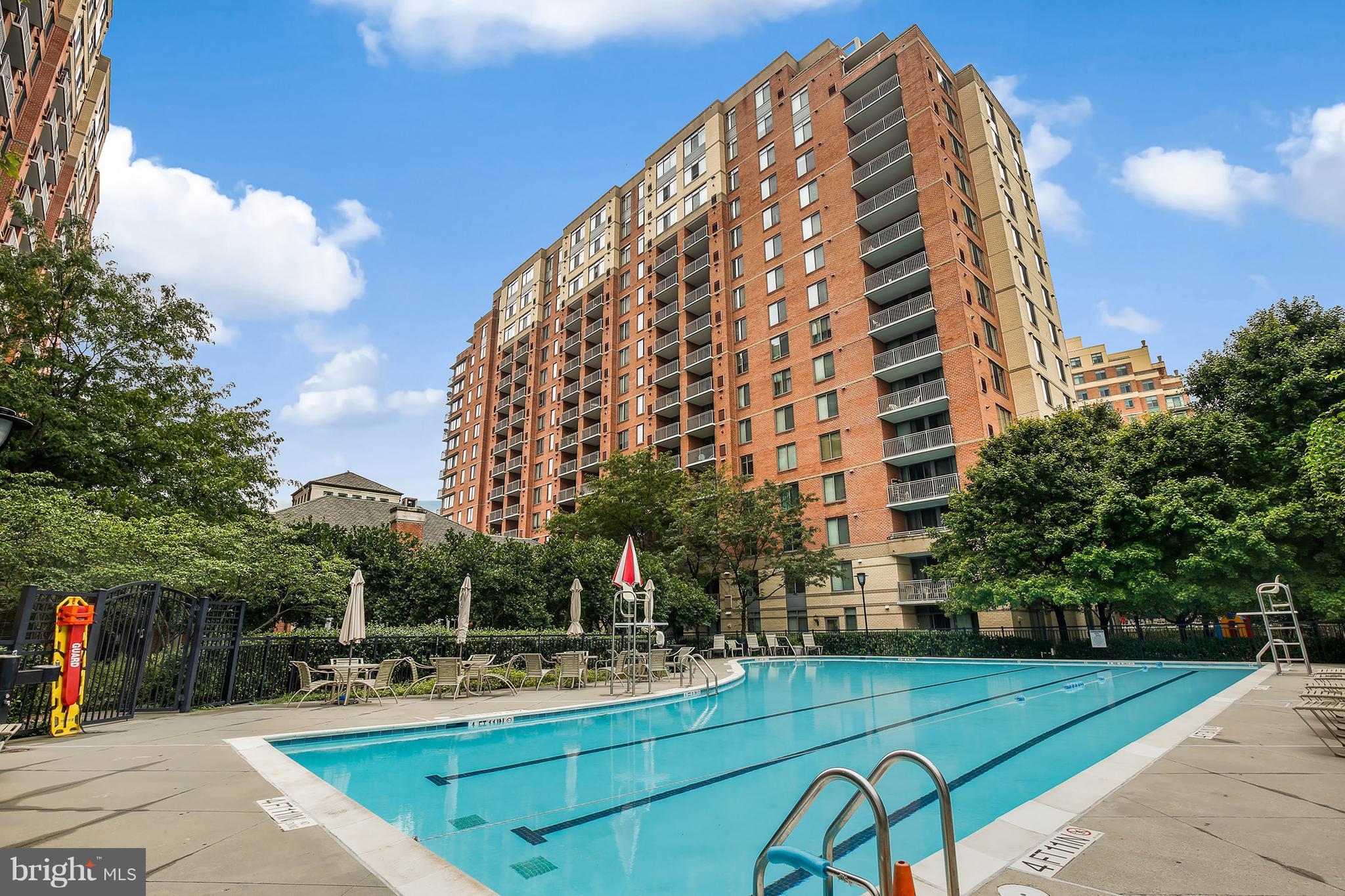 11710 Old Georgetown Road, Unit 1124 North Bethesda, MD 20852 - Photo 27 of 30 a view of a tall building next to a yard