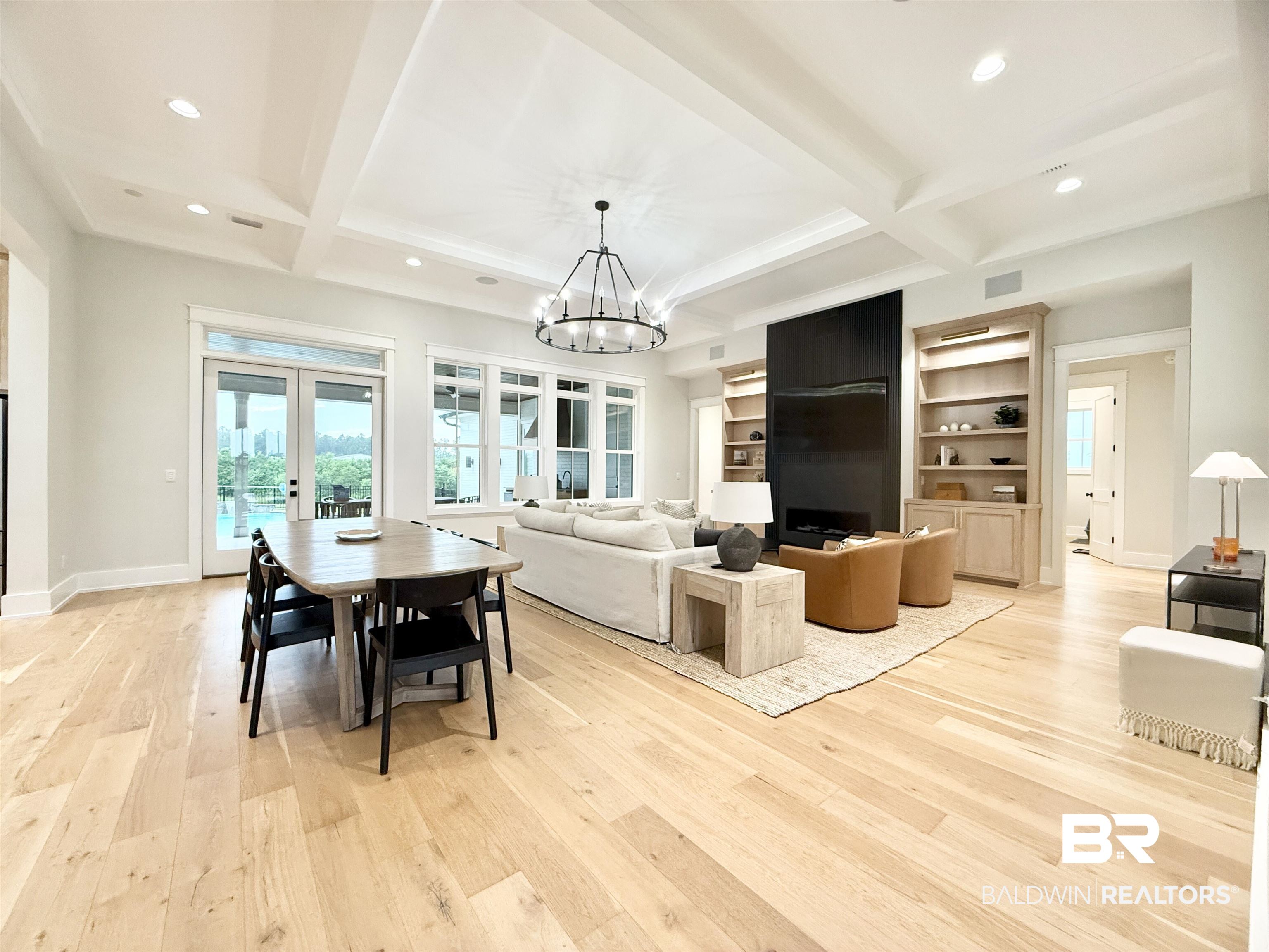 21767 Gallery Boulevard Fairhope, AL 36532 - Photo 6 of 74 Dining room with recessed lighting, beam ceiling, french doors, light wood-style floors, and coffered ceiling