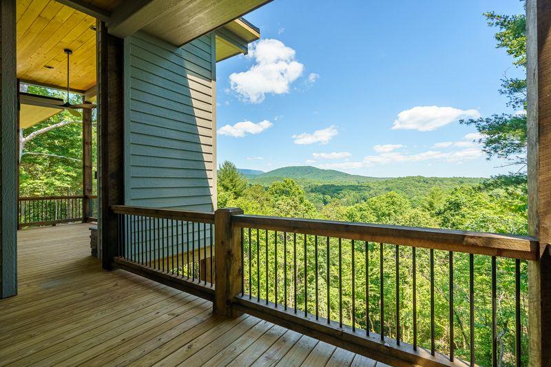 216 Old Orchard Road Ellijay, GA 30536 - Photo 32 of 59 a view of a balcony with wooden floor