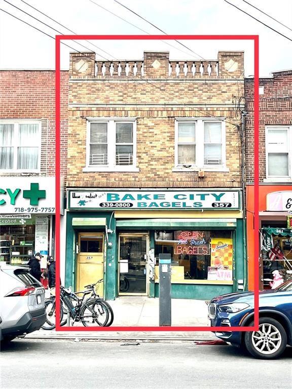357 Avenue X Brooklyn, NY 11223 - Photo 4 of 6 a view of a cars park in front of a store