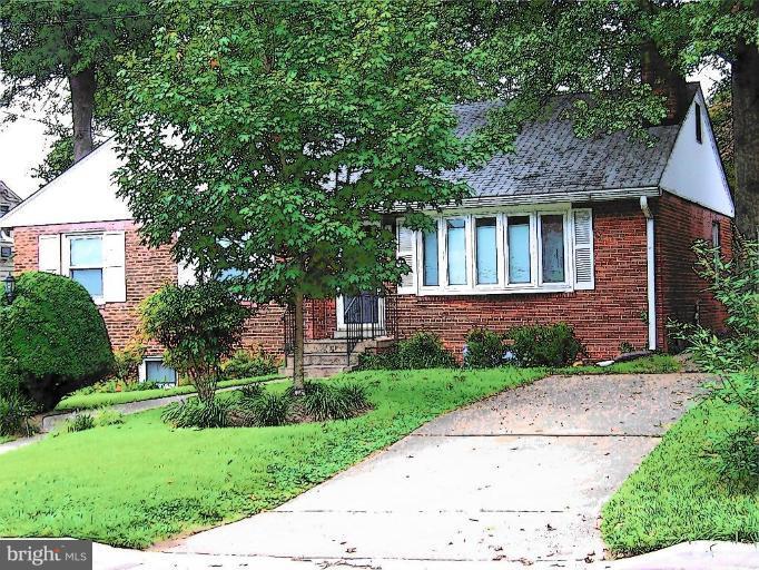 9904 Renfrew Road Silver Spring, MD 20901 - Photo 1 of 15 a front view of a house with a garden