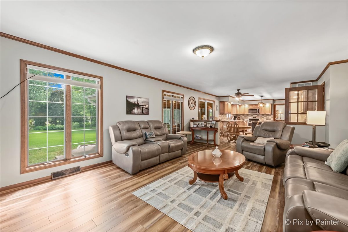 2N445 Beith Road Elburn, IL 60119 - Photo 12 of 58 a living room with furniture and a large window