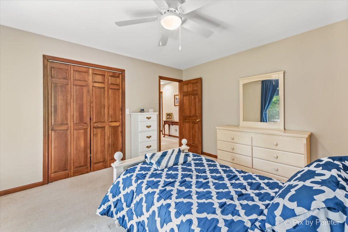 2N445 Beith Road Elburn, IL 60119 - Photo 28 of 58 a bedroom with a bed and a cabinets