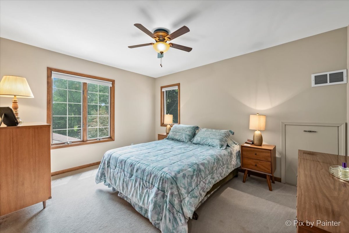 2N445 Beith Road Elburn, IL 60119 - Photo 29 of 58 a bedroom with a bed and a large window