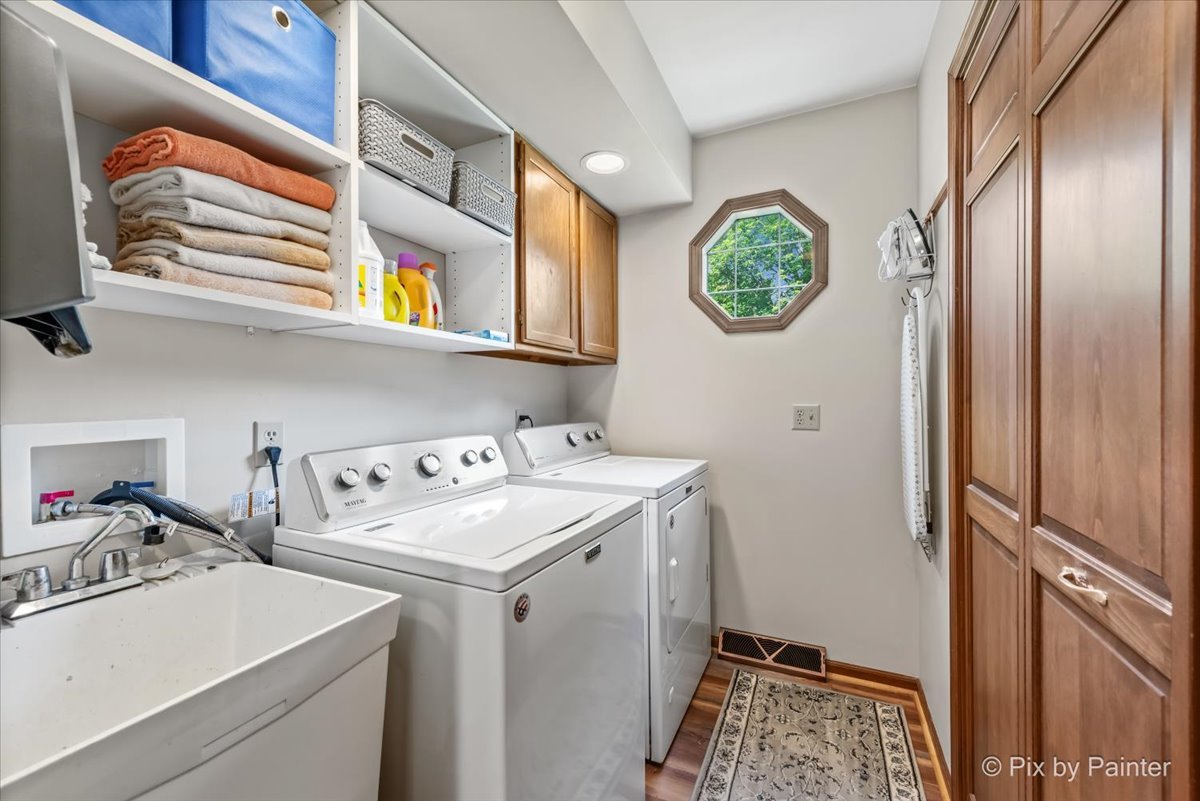 2N445 Beith Road Elburn, IL 60119 - Photo 33 of 58 a bathroom with a sink a vanity and a window