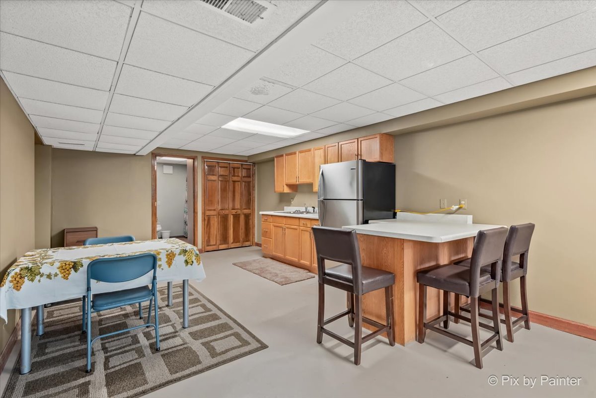 2N445 Beith Road Elburn, IL 60119 - Photo 36 of 58 a dining room with furniture and a table