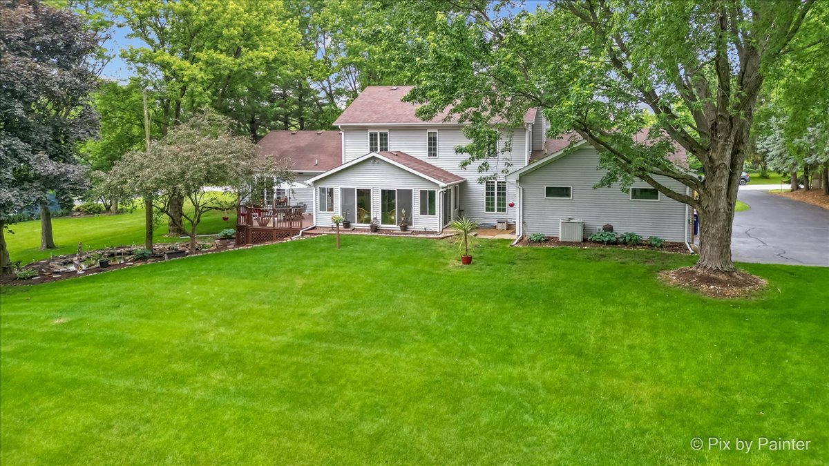 2N445 Beith Road Elburn, IL 60119 - Photo 42 of 58 a front view of a house with a yard and trees