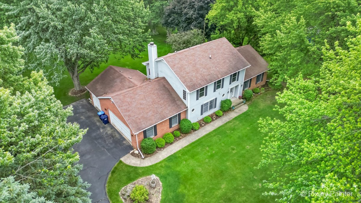 2N445 Beith Road Elburn, IL 60119 - Photo 46 of 58 an aerial view of a house with swimming pool and big yard