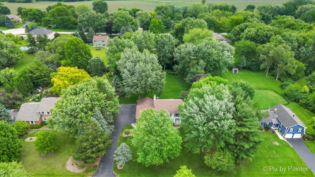 2N445 Beith Road Elburn, IL 60119 - Photo 48 of 58 an aerial view of residential house with outdoor space and trees all around