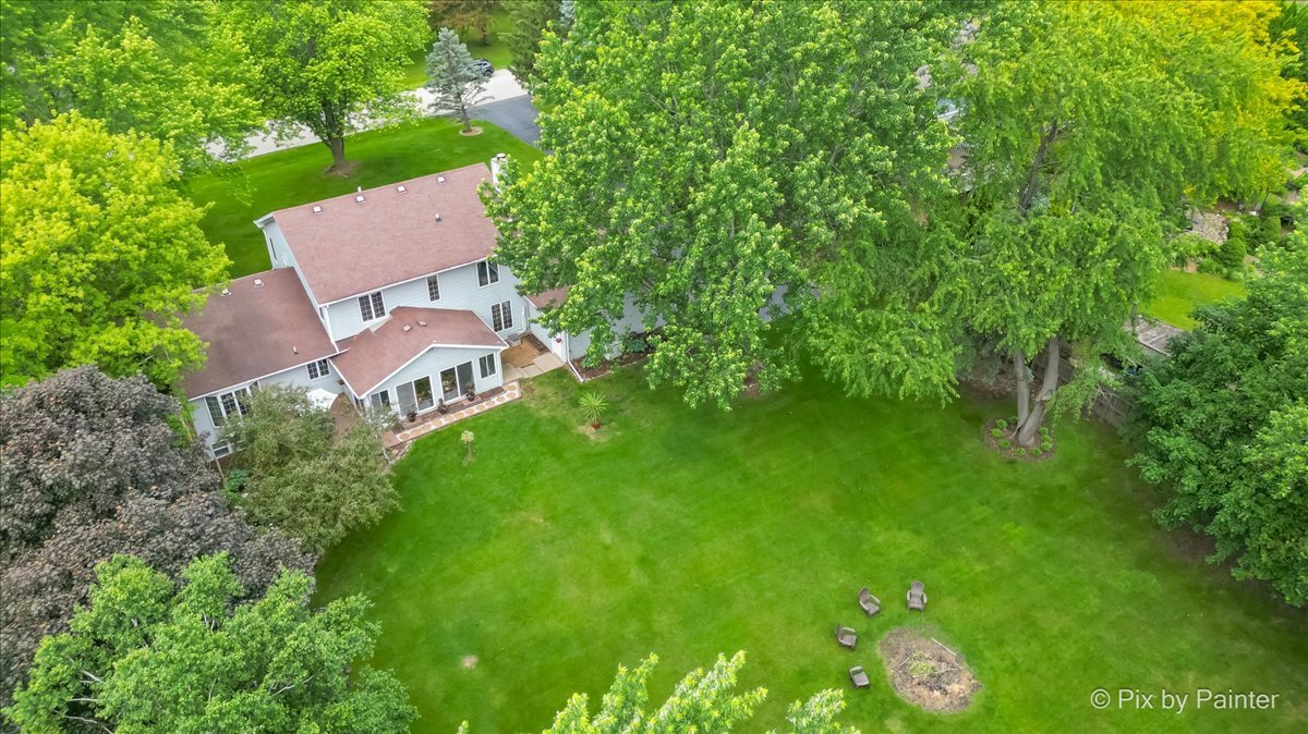 2N445 Beith Road Elburn, IL 60119 - Photo 55 of 58 a backyard of a house with table and chairs
