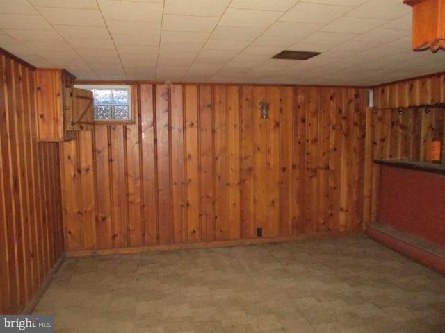 6125 Dunroming Road Baltimore, MD 21239 - Photo 17 of 21 a view of a room with a window and a curtain