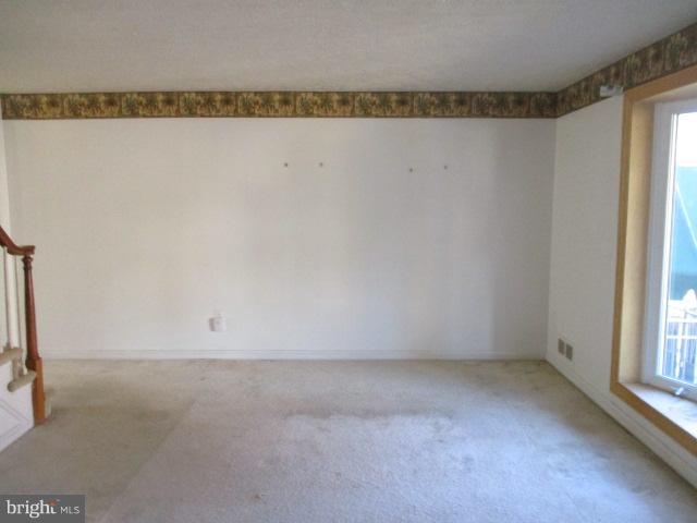 6125 Dunroming Road Baltimore, MD 21239 - Photo 3 of 21 a view of a room that has a window in it
