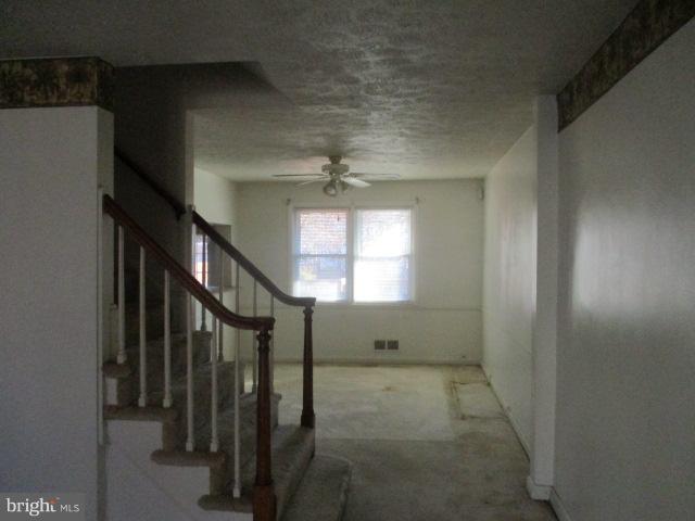 6125 Dunroming Road Baltimore, MD 21239 - Photo 4 of 21 a view of entryway and hall with a window