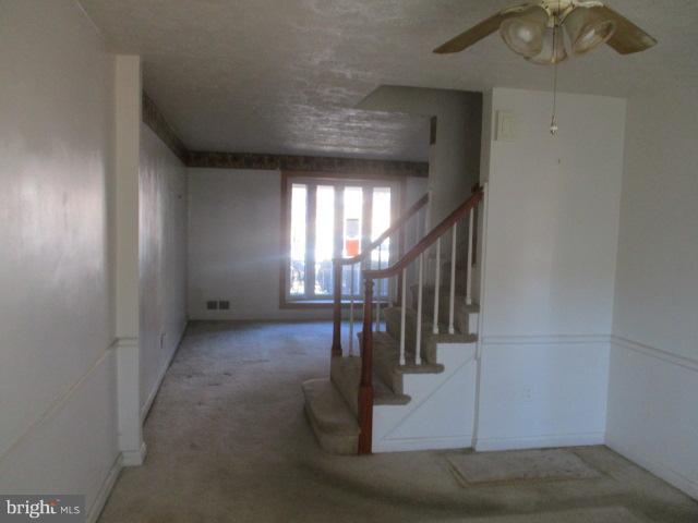 6125 Dunroming Road Baltimore, MD 21239 - Photo 5 of 21 a view of entryway and hall with a window
