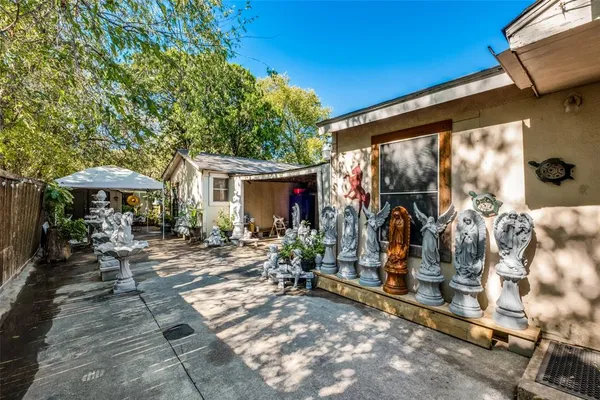 a view of a wooden house with a patio