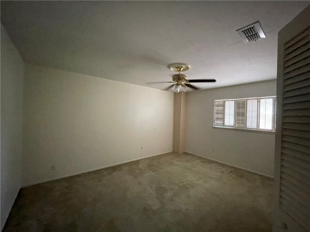 5218 Wooldridge Road Corpus Christi, TX 78413 - Photo 22 of 29 an empty room with a window