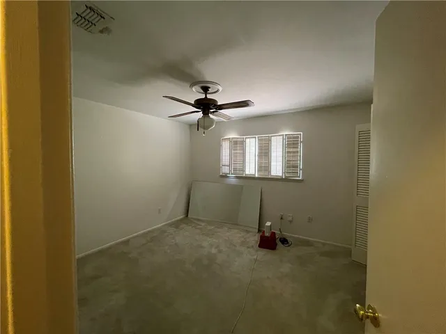 a view of a room with a window