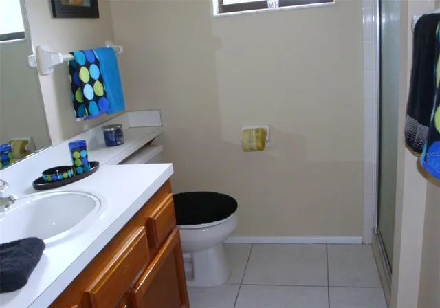 a bathroom with a sink and toilet