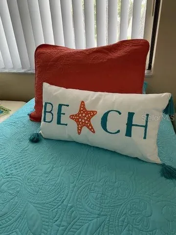 a view of staircase with rug and white walls