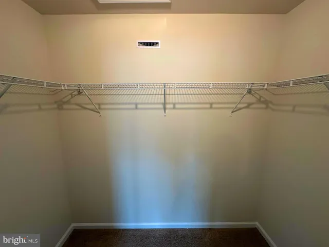 a view of small space with racks on the wall