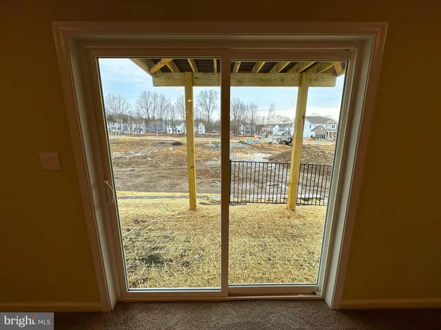 a view of window and an empty room