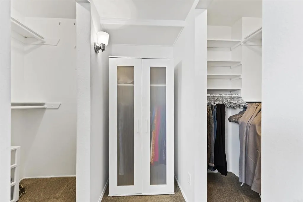 7883 Rancho Fanita Drive, Unit A Santee, CA 92071 - Photo 14 of 27 a view of a hallway with a closet