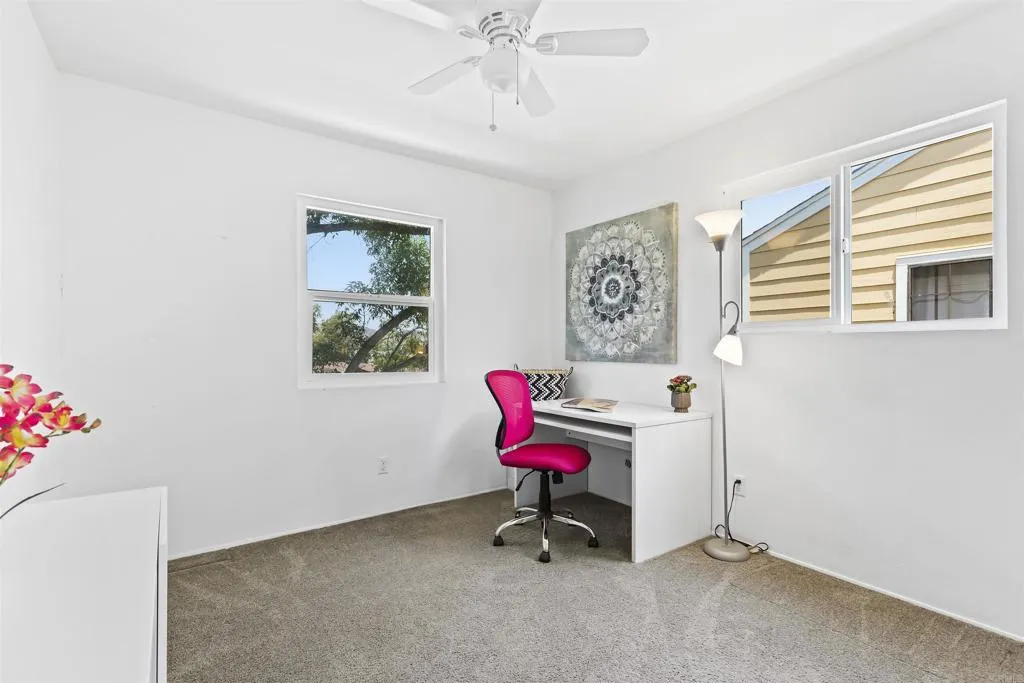 7883 Rancho Fanita Drive, Unit A Santee, CA 92071 - Photo 20 of 27 a chair and table in a room