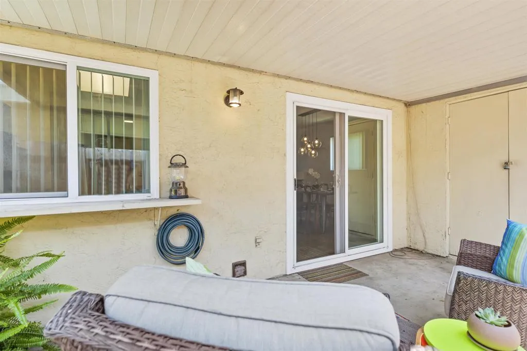 7883 Rancho Fanita Drive, Unit A Santee, CA 92071 - Photo 24 of 27 a bedroom with a bed and a window