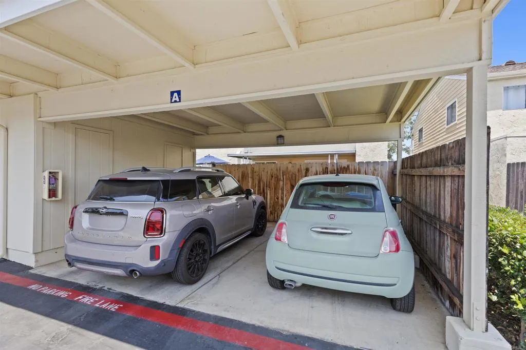 7883 Rancho Fanita Drive, Unit A Santee, CA 92071 - Photo 26 of 27 a view of parking garage with cars parked