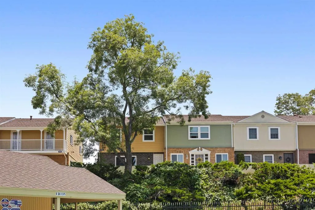 7883 Rancho Fanita Drive, Unit A Santee, CA 92071 - Photo 27 of 27 a front view of a house with a yard