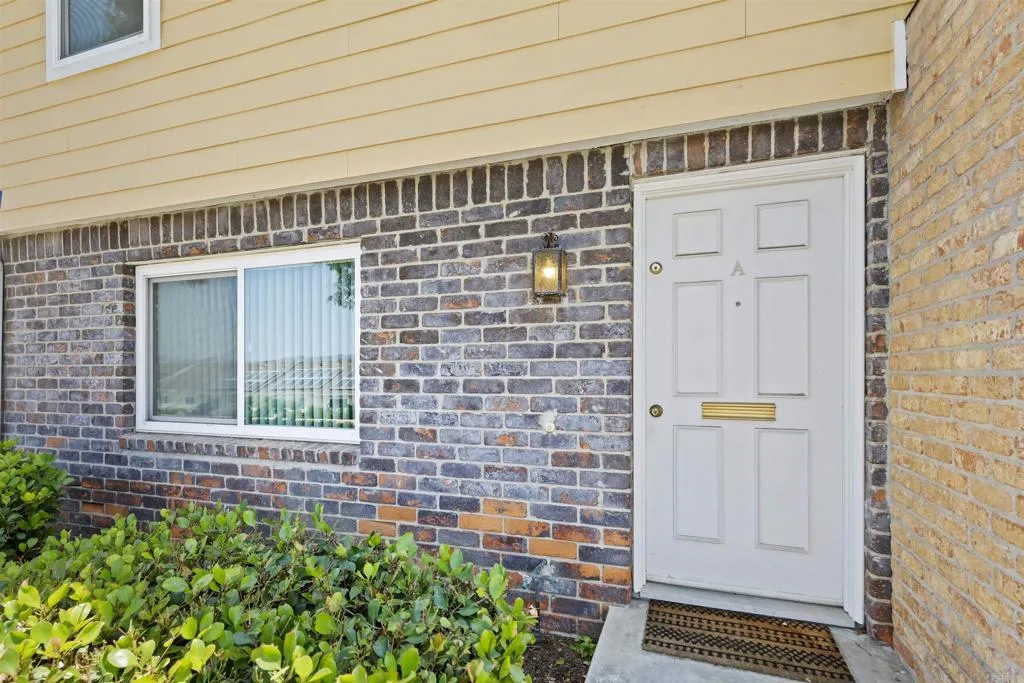 7883 Rancho Fanita Drive, Unit A Santee, CA 92071 - Photo 3 of 27 a front view of a house with a shower